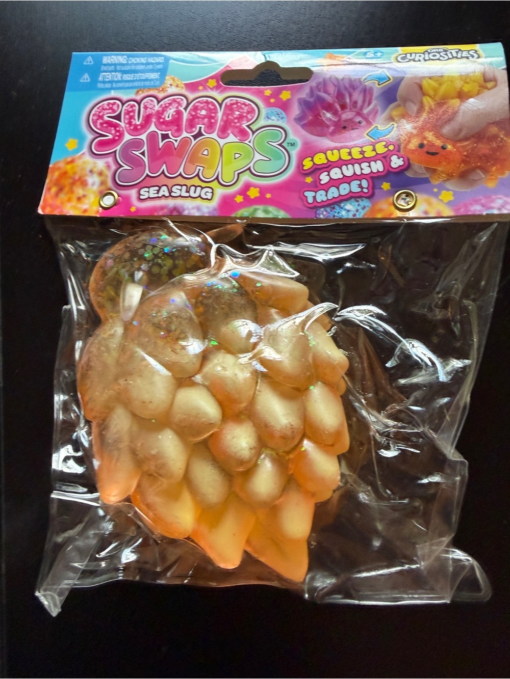 New Orb Sugar Swaps Orange Squishy 5" Squeeze Textured Glitter Toy 5+ Sea Slug